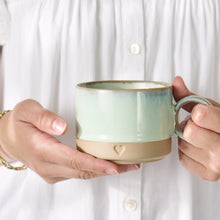 Load image into Gallery viewer, Mug with heart motif - light blue edge
