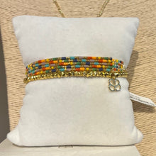 Load image into Gallery viewer, Crocus layer multicoloured bracelet stack
