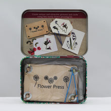 Load image into Gallery viewer, Flower pressing in a tin
